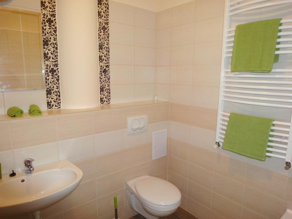 Aqua Apartmanok Печ Стая снимка